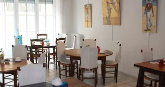 La salle des petits déjeuners de l'Hôtel au Marais