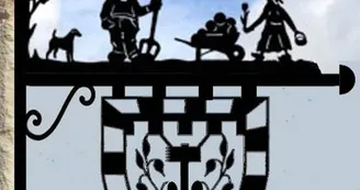 L'enseigne en fer forgé de notre gîte, avec le blason du village de Bulson