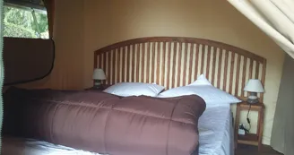 Lodges au Camping du Sans Souci à Fresnay-sur-Sarthe - chambre